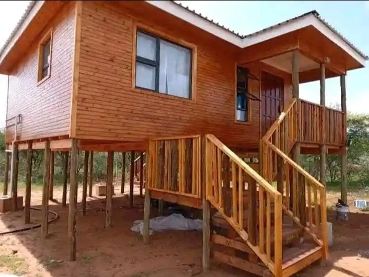 Wooden Wendy house built in a garden for storage